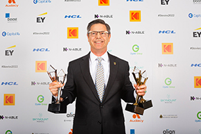 Todd Browne ’85 Holding Four Stevie Awards WPAOG Won